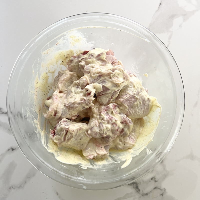Chicken tossed with mayo and mustard mixture