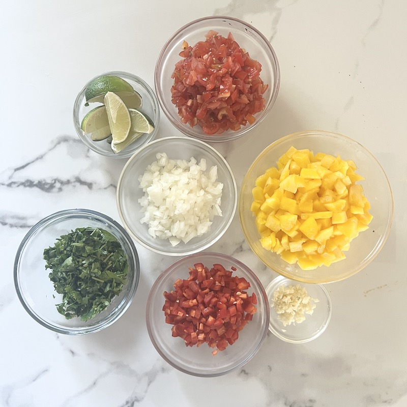 All Mango Salsa ingredients in a prep bowl 