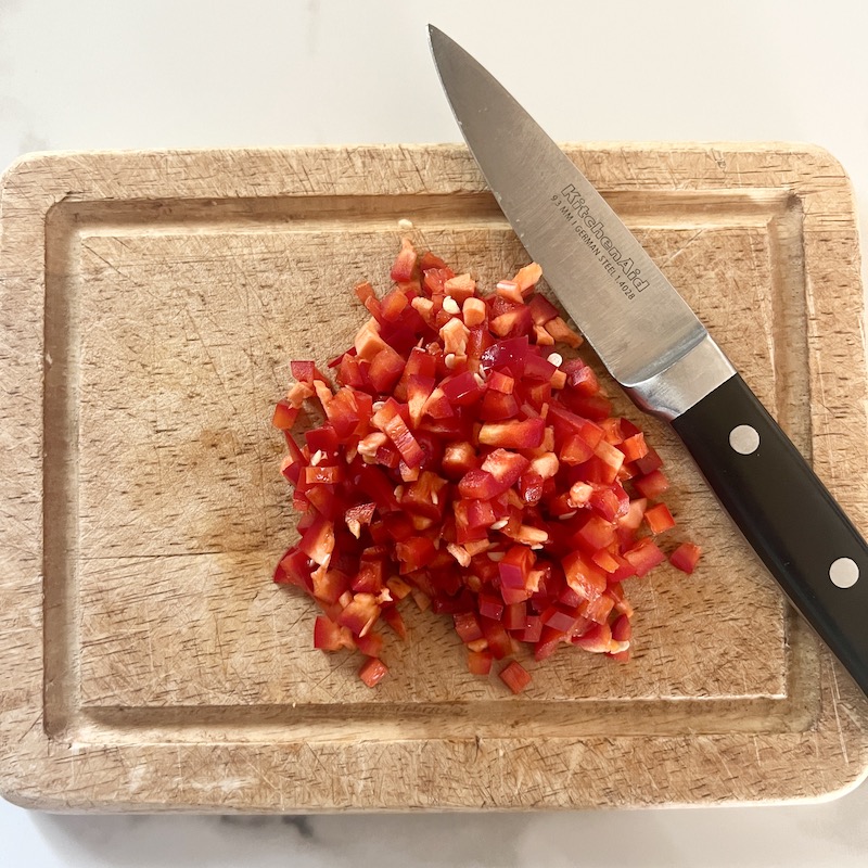 Seared Honey Ginger Salmon Bowl diced red jalapeno pepper